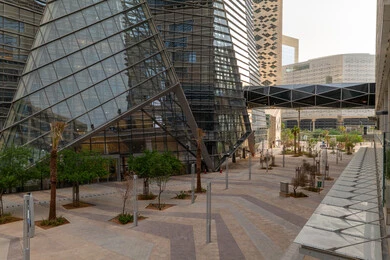 The ideal destination for finance and business in the Kingdom of Saudi Arabia, modern architectural style of commercial buildings, King Abdullah Financial District (KAFD) towers in Riyadh during the day, achieving economic renaissance, leading companies in banking services