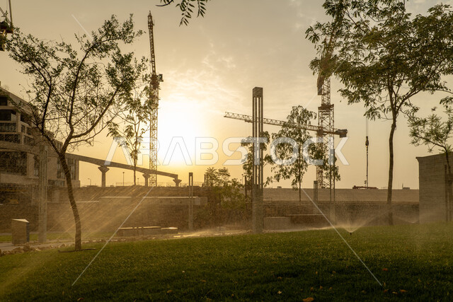 غروب الشمس فوق مركز الملك عبدالله المالي (كافد) في مدينة الرياض, تحقيق النهضة الاقتصادية, الشركات الرائدة في الخدمات المصرفية، الوجهة المثالية للمال والأعمال في المملكة العربية السعودية، الفن الهندسي المعماري على الطراز الحديث للمباني التجارية