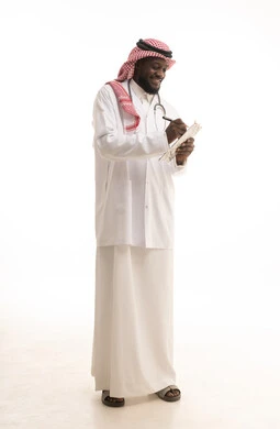 Preparing medical reports, working in the health sector, recording test results in the medical record with gestures of cheerfulness and joy, a portrait of an Arab Gulf Saudi doctor wearing traditional attire and a white coat, holding patient files in hand, full-body image, white background. Preparing medical reports, working in the health sector, recording test results in the medical record with gestures of cheerfulness and joy, a portrait of an Arab Gulf Saudi doctor wearing traditional attire and a white coat, holding patient files in hand, full-body image, white background.