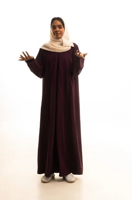 The questioning and inquiry about a matter, a portrait of a Gulf Arab Saudi woman wearing an abaya and hijab, raising her hands with gestures of confusion and surprise, blame and reprimand for an action, feeling of discomfort and dissatisfaction, full-body image, white background.