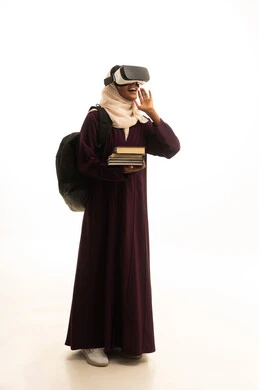 Simulation of the imaginary world, integrating modern technologies with learning and training, education using virtual reality technology, a portrait of a Saudi Gulf Arab student wearing an abaya and hijab, wearing 3D VR glasses and holding a collection of books, white background.