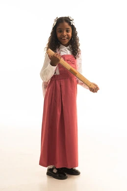 Stationery and school supplies, intelligence and cleverness in mathematics, a portrait of a smiling Arab Gulf Saudi student wearing a school uniform, carrying a school bag and a numbered wooden ruler, elegance and attention to appearance, full-body image, white background.