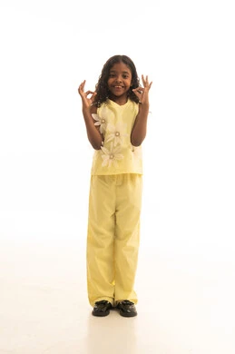 The concept of admiration and satisfaction, a mark of quality and excellence, looking at the camera with expressions of joy and happiness, a portrait of a Gulf Arab Saudi girl wearing casual attire, raising her hands up with gestures of acceptance and approval, full-body image, white background.