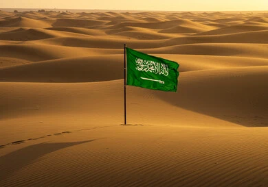 Planting the flag of the Kingdom of Saudi Arabia in the middle of the desert, the banner of unification and the emblem of the nation, celebrating national occasions and holidays, Flag Day March 11, Saudi National Day September 23