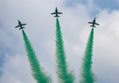 Air show for the National Day celebrations, Saudi National Day, September 23, military aircraft flying in the skies of the Kingdom of Saudi Arabia on Flag Day, March 11, decorating the sky with colored smoke