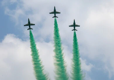 Air show for the National Day celebrations, Saudi National Day, September 23, military aircraft flying in the skies of the Kingdom of Saudi Arabia on Flag Day, March 11, decorating the sky with colored smoke