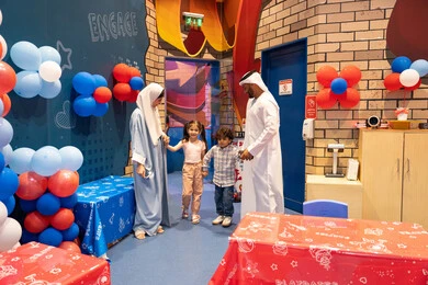 Amusement centers in the UAE, spending happy times in the land of fun, an Arab Gulf Emirati family enjoying playing in the amusement park, feelings of fun and joy, the concept of entertainment and fun, enjoyable recreational activities Amusement centers in the UAE, spending happy times in the land of fun, an Arab Gulf Emirati family enjoying playing in the amusement park, feelings of fun and joy, the concept of entertainment and fun, enjoyable recreational activities