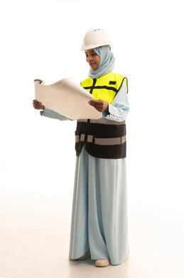 Leadership and management of engineering projects, a profession and engineering job for women, the concept of studying the plan and construction project, a portrait of a Saudi Gulf Arab engineer wearing an abaya, jacket, and safety helmet working in the engineering sector in the Kingdom of Saudi Arabia, white background.
