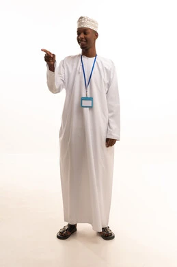 Wearing a personal badge, a personal identification card with the employee's name, a white rectangular mock-up, looking at the camera with expressions of joy, a portrait of a young Arab Gulf Omani man with a dark complexion wearing a dishdasha and a kumma, looking with gestures of happiness, white background.