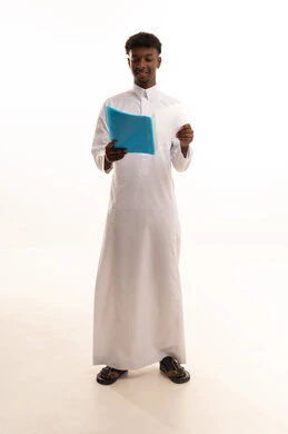 Preparing work-related reports, proofreading notes, a portrait of a young Arab Gulf Saudi man with a dark complexion wearing a white thobe holding a stack of white papers, reviewing and following up on office plans and projects with focused gestures, white background.