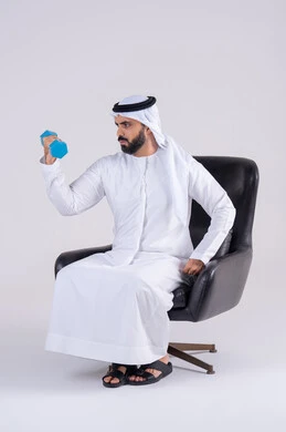 Exercising with dumbbells, weightlifting exercises (dumbbells), a portrait of an Emirati Gulf Arab man wearing a kandura and ghutra, lifting heavy iron weights, maintaining health and physical fitness.