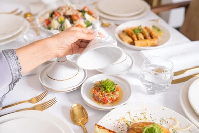 A table of the most delicious Western foods in an upscale restaurant, delicious healthy dishes, restaurants serving Arabic and Western cuisine in the United Arab Emirates, delicious meals, foods with high nutritional value