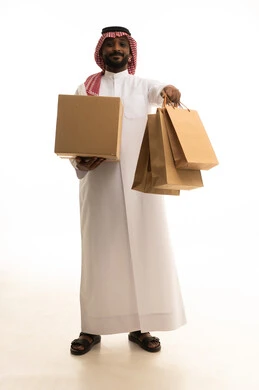 Reliable shipping and delivery process, fast delivery services, ordering and receiving delivery, portrait of an Arab Saudi Gulf man wearing traditional attire and a ghutrah working in delivering orders and goods to customers, online shopping and online orders, white background.