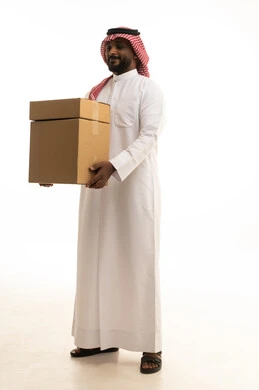 Reliable shipping and delivery process, fast delivery services, ordering and receiving delivery, portrait of an Arab Saudi Gulf man wearing traditional attire and a ghutrah working in delivering orders and goods to customers, online shopping and online orders, white background.