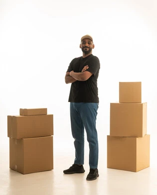 A portrait of a Saudi Arabian Gulf man wearing casual attire delivering boxes of household items while holding a notebook in his hand, owning a new home and family stability, modern housing and ownership, delivering orders to homes, organizing and arranging the house, full-body image, white background.
