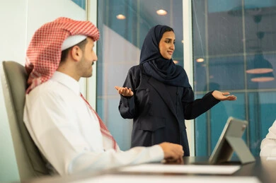 Unity and teamwork, work development and problem solving, holding a meeting for a Saudi Gulf Arab team at the company's headquarters, studying and analyzing new projects, workshops and training, using modern technical equipment, a Saudi office profession and job.