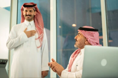 Welcoming new employees, greeting and greeting them, using modern technical equipment, Saudi office profession and job, unity and teamwork, work development and problem solving, conducting a meeting for a Saudi Gulf Arab team at the company headquarters, studying and analyzing new projects, conducting a job interview