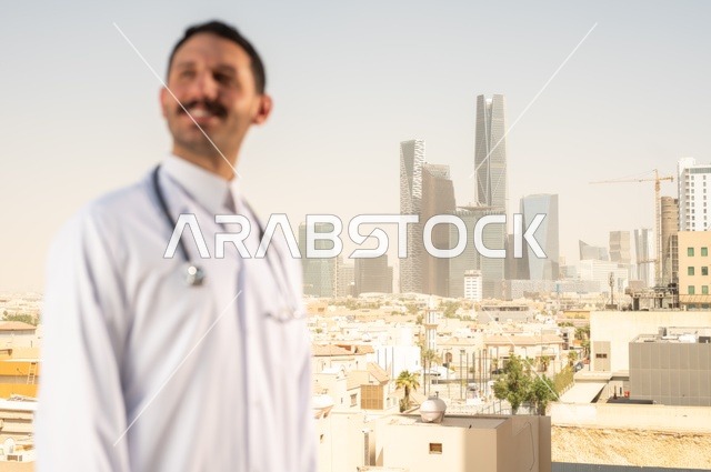 The concept of medical examination, working in the health sector, providing medical services to patients, a Saudi Arabian Gulf Arab doctor wearing a traditional thobe and medical coat, wearing a stethoscope, working in health centers and hospitals, background of Riyadh towers