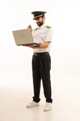 Reception and welcome crew, working in the aviation field, tourist flights, using a laptop, the concept of tourism and travel, Saudi Airlines, portrait of a smiling Saudi Arabian Gulf Arab pilot in uniform standing straight, full body, white background