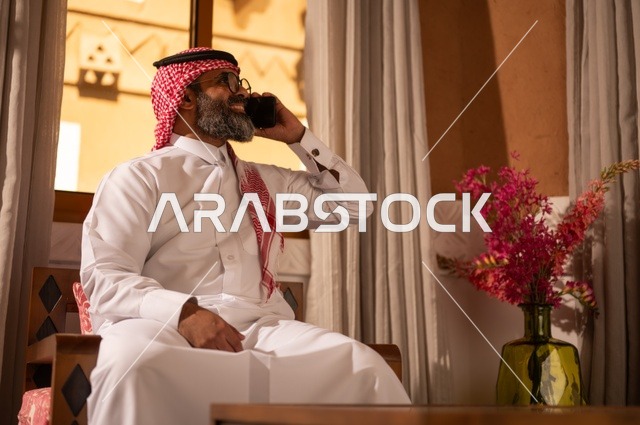 Making a phone call, a traditional Arab environment enhanced with ...