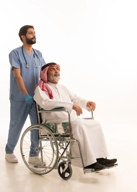The concept of healthcare and caring for patients and the disabled, lifestyle of people with disabilities, gestures of pleasure and happiness, portrait of a nurse wearing a uniform and a mask taking care of a disabled Saudi Arabian Gulf man wearing a traditional thobe and shemagh sitting in a wheelchair, full body image, white background