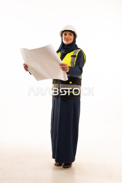 Following and reading engineering plans, the role of structural engineering in the development of Saudi society, the role of structural engineering in the development of Saudi society, a portrait of a Gulf Arab Saudi Muslim female engineer wearing a white helmet and safety vest, full-body, white background.