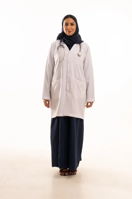 Attention to appearance, looking at the camera with gestures of self-confidence, providing medical examinations and treatment services, a close-up portrait of a smiling Saudi Gulf Arab female doctor wearing a lab coat and stethoscope, the concept of femininity and softness, white background.