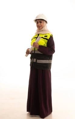 العمل في القطاع الهندسي، مخططات و مشاريع اعمارية، مهن ووظائف نسائية هندسية، بورتريه لمهندسة عربية خليجية سعودية محجبة ترتدي خوذة وسترة الحماية تحمل بيدها مخطط المشروع،الاشراف على العمل، صورة لكامل الجسم، خلفية بيضاء العمل في القطاع الهندسي، مخططات و مشاريع اعمارية، مهن ووظائف نسائية هندسية، بورتريه لمهندسة عربية خليجية سعودية محجبة ترتدي خوذة وسترة الحماية تحمل بيدها مخطط المشروع،الاشراف على العمل، صورة لكامل الجسم، خلفية بيضاء