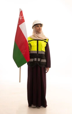 Celebrating the anniversary of the National Day, pride in belonging to the country, pride in the symbols and the Omani flag, a portrait of a Saudi Gulf Arab engineer wearing a helmet and safety vest standing upright holding the flag of the Sultanate of Oman with expressions of self-confidence, full-body, white background. Celebrating the anniversary of the National Day, pride in belonging to the country, pride in the symbols and the Omani flag, a portrait of a Saudi Gulf Arab engineer wearing a helmet and safety vest standing upright holding the flag of the Sultanate of Oman with expressions of self-confidence, full-body, white background.