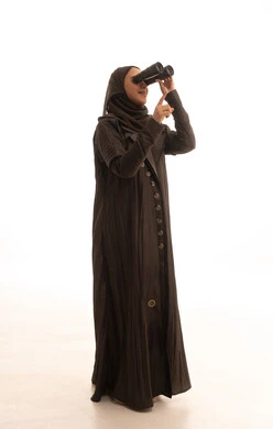 Pointing to something, thinking and looking to the future, future planning for goals and ambitions, seeing distant things, love of exploration and adventure, a portrait of a young Arab Gulf Saudi woman wearing an abaya and hijab holding binoculars looking at something, full-body, white background.