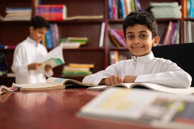 The concept of self-education, an advanced educational school environment, practicing the hobby of reading, a group of Arab Gulf Saudi students wearing traditional attire sitting in the school library, enjoying reading school books, education in the Kingdom of Saudi Arabia. The concept of self-education, an advanced educational school environment, practicing the hobby of reading, a group of Arab Gulf Saudi students wearing traditional attire sitting in the school library, enjoying reading school books, education in the Kingdom of Saudi Arabia.