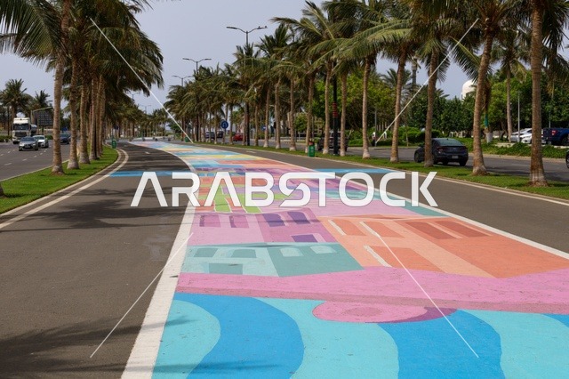 صورة لممشى كورنيش جدة الملون ، الواجهة البحرية في مدينة جدة بالمملكة العربية السعودية ، المعالم السياحية في المدينة الساحلية بجدة