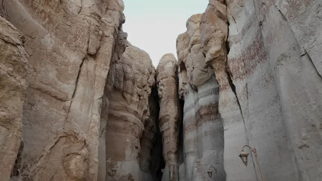 A place and an ancient historical archaeological site in the Kingdom of Saudi Arabia, the Cave of Jabal Al-Qarah in Al-Ahsa, the rock formations and structures in the mountains, the natural landscapes sculpted in tourist cities.