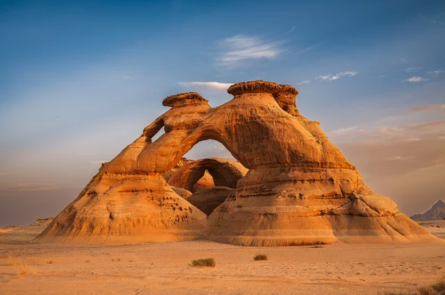 The historic Mahja Mountain is located in the Hail region in the north of the Kingdom of Saudi Arabia. Mahja Mountain is a rock formation that was formed due to erosion and weathering factors. It is a sedimentary mountain made of sandstone, featuring rock formations in the Hail area, and it is an ancient archaeological tourist attraction in Saudi Arabia.