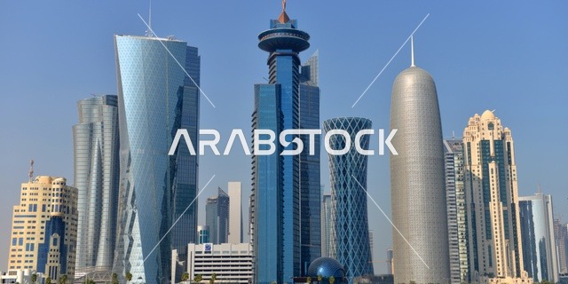 The architectural engineering art of towers and skyscrapers in the Dafna area of Qatar, the growth and urban development in the modern style of buildings overlooking the Corniche of Doha.