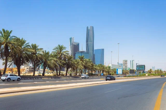 The King Abdullah Financial Center (KAFD) towers in Riyadh during the day, achieving economic revival, leading companies in banking services, the ideal destination for finance and business in the Kingdom of Saudi Arabia, the architectural engineering art in the modern style of commercial buildings.