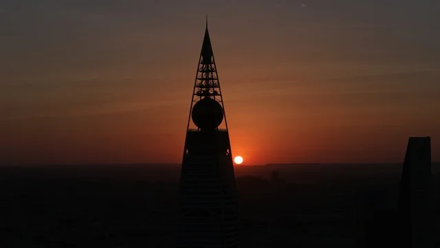 The Kingdom Centre Tower in Riyadh, Saudi Arabia at sunset, the towers of Riyadh, illuminated towers and skyscrapers, architectural art, the famous landmarks of Riyadh.