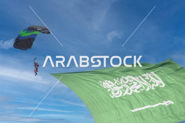 أنشطة ترفيهية رياضية ، نشاط القفز المظلي فى سماء السعودية ، الطيران الشرعي ، علم المملكة العربية  السعودية