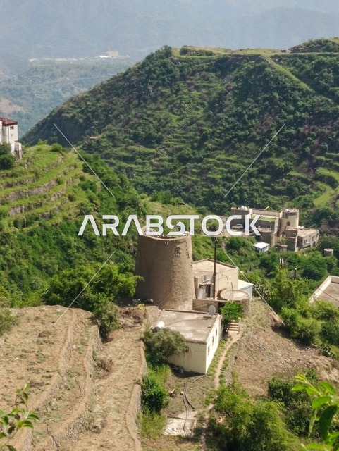 The distinctive landscapes, the enchanting nature in the province of Faifa in the Jazan region in the south of the Kingdom of Saudi Arabia, the famous tourist spots, the green plants and trees on the peaks and mountainous heights in the Jazan region.