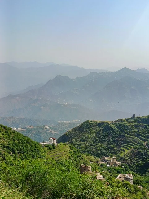 The agricultural terraces in the city of Jazan in Saudi Arabia, the houses and residential buildings on the peaks and mountain heights in the province of Faifa, the trees and green plants on the slopes of the mountains, the natural backdrop in the kingdom.