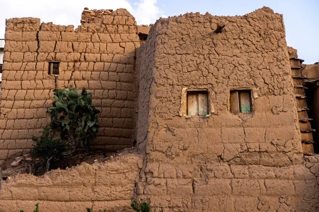 Famous landmarks and tourist attractions, tourism in ancient heritage villages, neighborhoods and traditional mud houses, ancient historical establishments in the village of Al-Batha in the Asir Province of the Kingdom of Saudi Arabia, Saudi civilization, authenticity, and heritage.