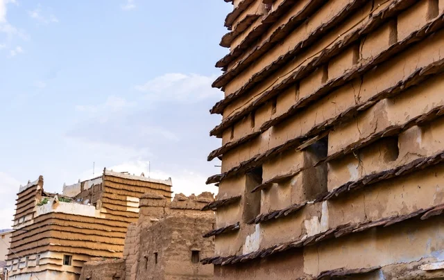 Famous landmarks and tourist attractions, tourism in ancient heritage villages, neighborhoods and traditional mud houses, ancient historical establishments in the village of Al-Batha in the Asir Province of the Kingdom of Saudi Arabia, Saudi civilization, authenticity, and heritage.