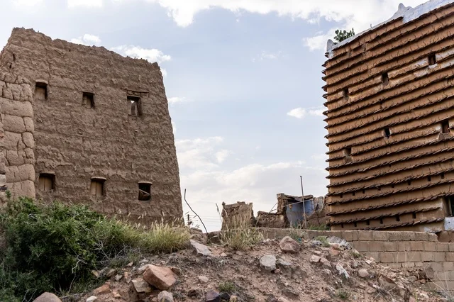 The ancient historical sites in the village of Al-Batha in the Asir Province of the Kingdom of Saudi Arabia, the civilization, authenticity, and Saudi heritage, famous landmarks and tourist attractions, tourism in the old heritage villages, neighborhoods, and traditional mud houses.