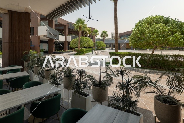 Entertainment and leisure centers and commercial shopping in the city of Riyadh, the Riyadh Front project, outdoor seating areas at the Roshan Front during the day, a recreational and tourist area in the Kingdom of Saudi Arabia, fun family activities and events.