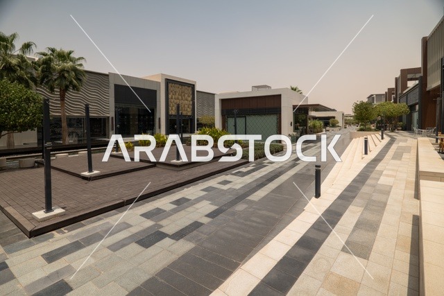 Entertainment and leisure centers and commercial shopping in the city of Riyadh, the Riyadh Front project, outdoor seating areas at the Roshan Front during the day, a recreational and tourist area in the Kingdom of Saudi Arabia, fun family activities and events.