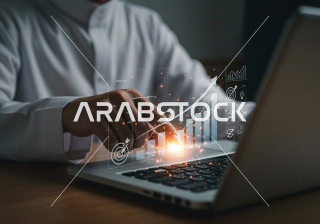 Statistical charts for the financial stock market using 3D hologram technology, digital e-commerce, a close-up image of a man's hands working on a laptop, monitoring stock indices and financial investment charts, growth and development in the economic field in Saudi Arabia.