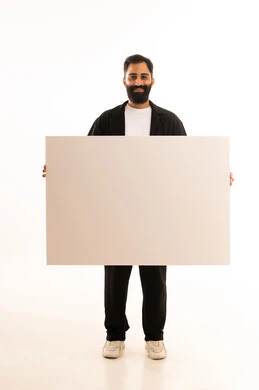 Gestures of happiness and joy, advertisements and marketing offers, use of illustrative boards and educational tools, a portrait of a smiling Omani Gulf Arab man wearing casual attire holding a white board (empty mock-up) in his hand, full body length, white background.