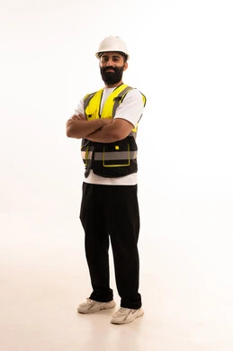 The concept of engineering and architectural construction, working in the engineering sector, a portrait of an Arab Gulf Omani engineer wearing casual attire, a helmet, and a safety vest, looking with expressions of joy, a profession and job for youth in the Sultanate of Oman, full-body, white background.