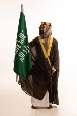 The anniversary of the establishment of the first Saudi state is on February 22, the day we began in 1727 AD. The commemoration of the Saudi National Day is on September 23. A portrait of an Arab Saudi Gulf man wearing a bisht, ghutrah, and agal on the day of establishment, raising the Saudi flag. Flag Day is on March 11, with a white background. The anniversary of the establishment of the first Saudi state is on February 22, the day we began in 1727 AD. The commemoration of the Saudi National Day is on September 23. A portrait of an Arab Saudi Gulf man wearing a bisht, ghutrah, and agal on the day of establishment, raising the Saudi flag. Flag Day is on March 11, with a white background.