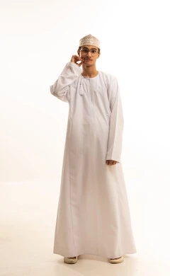 Authentic Arab masculinity, attention to appearance, looking at the camera with gestures of seriousness, the concept of handsomeness and self-confidence, a portrait of an Omani Gulf Arab man wearing a dishdasha and kumma, holding his mustache, giving sincere promises, full-body, white background.